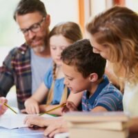 Family learning Greek together