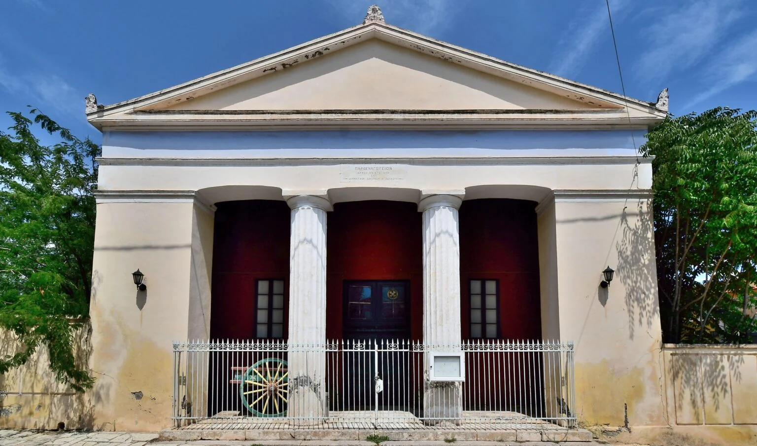 Neoclassical façade of the former Girls' School in Galaxidi with Doric columns
