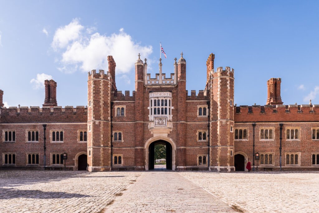 Tudor Great Gatehouse at Hampton Court Palace, the royal court culture in which elite forms of English first acquired prestige.