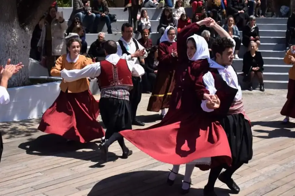 Dancers performing the Thermiotikos Ballos in traditional dress on Kythnos, Intangible Cultural Heritage in Greece