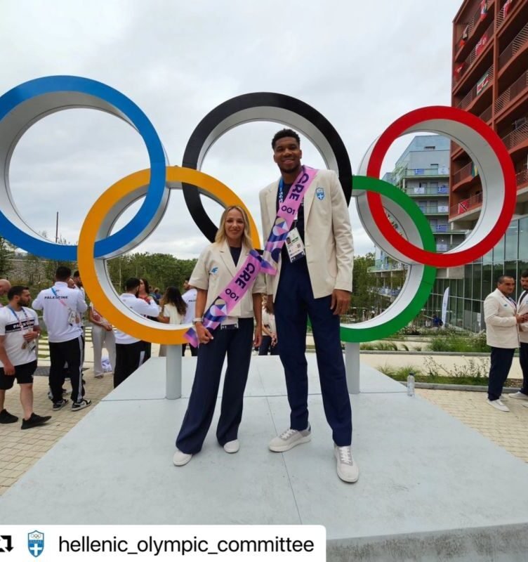 Giannis Antetokounmpo and Antigoni Drisbioti proudly represented Greece as flag bearers for the 2024 Olympic Games in Paris. Photo Creidit: Hellenic Olympic Committee via LinkedIn