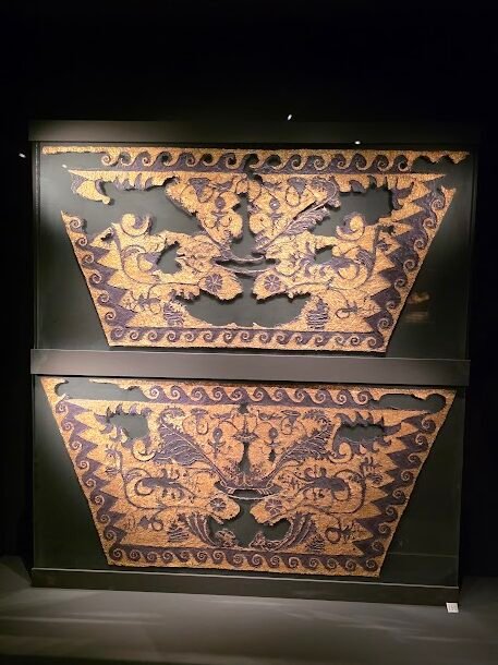 Gold and purple funerary fabric that wrapped the bones of Meda, highlighting royal burial customs. Museum of the Royal Tombs of Aigai, Expats Athens, Expats Greece, Xpat.gr