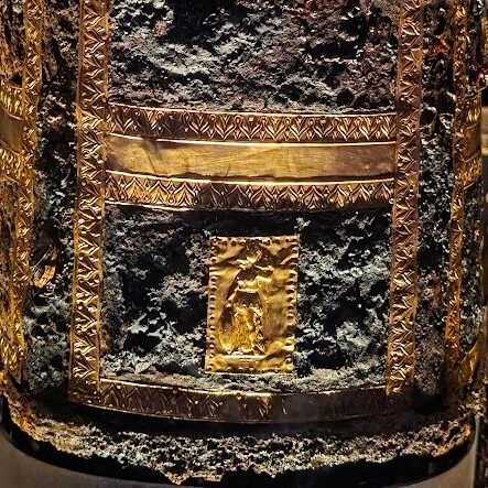 Close-up of the small gold depiction of Athena on Philip II’s iron cuirass, reminiscent of Phidias’ Athena Parthenos. Served as a talisman and symbol of protection for the king in battle. Museum of the Royal Tombs of Aigai, Expats Athens, Expats Greece, Xpat.gr