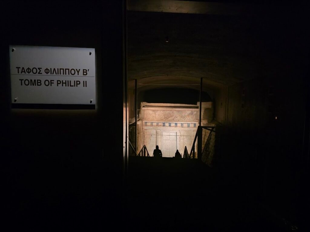 Entrance to the tomb of King Philip II, inviting visitors to descend into the historic site and reflect on the legacy of Macedonia’s great king. Museum of the Royal Tombs of Aigai, Expats Athens, Expats Greece, Xpat.gr