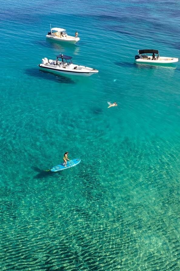 Turquoise Fantasy Route cruise exploring Kefalonia's crystal-clear coastline with SUP and swimming activities