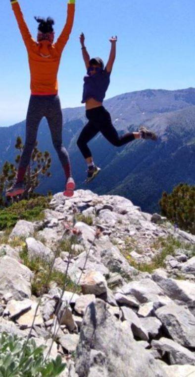 Hikers celebrating on the Mount Olympus trail during an Unlimited Adrenaline two-day climbing experience featured on Xpat.gr.