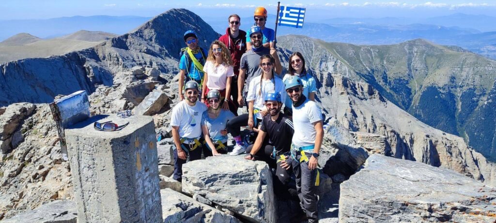 Group of hikers at the summit area of Mount Olympus during an Unlimited Adrenaline Peak Ascend activity featured on Xpat.gr.
