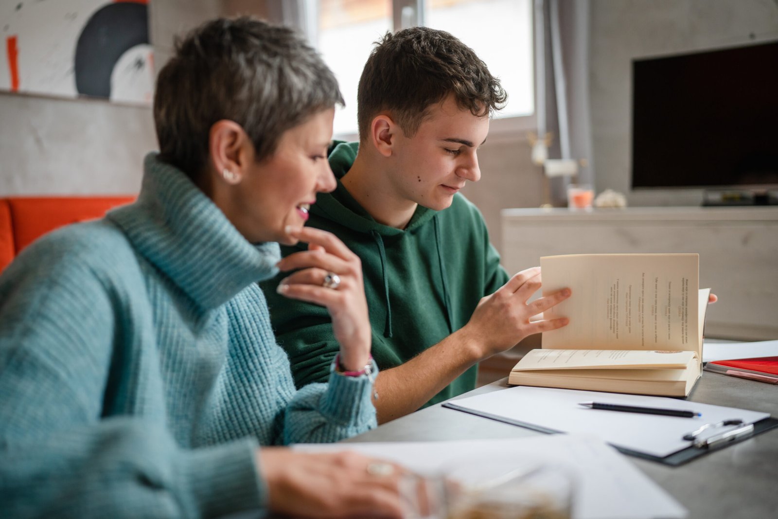 Teenager studying with a private tutor in Greece, representing tutoring culture, international school pressure and university preparation.