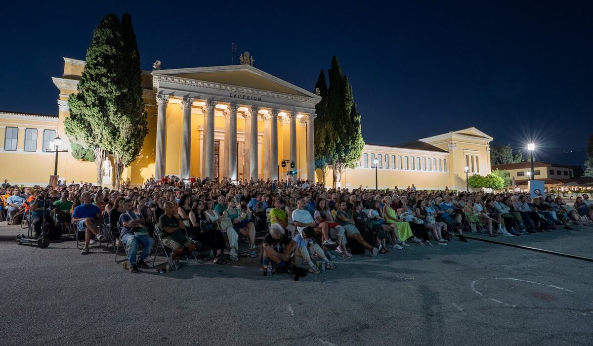 People attending an Athens Open Air Film Festival screening in front of Zappeion, Athens.
