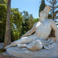 Marble statue of the dying Achilles by Ernst Herter in the gardens of the Achilleion Palace in Corfu.