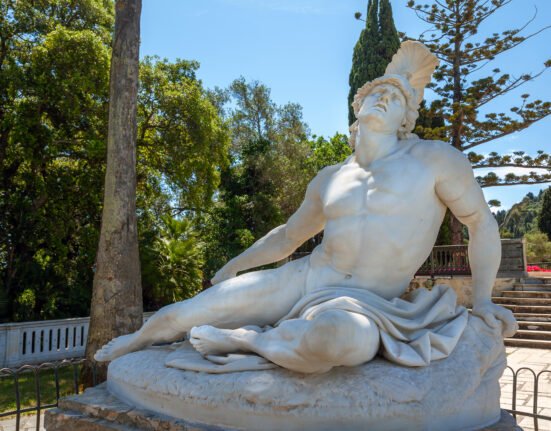 Marble statue of the dying Achilles by Ernst Herter in the gardens of the Achilleion Palace in Corfu.