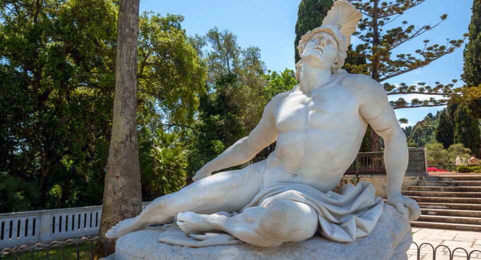 Marble statue of the dying Achilles by Ernst Herter in the gardens of the Achilleion Palace in Corfu.