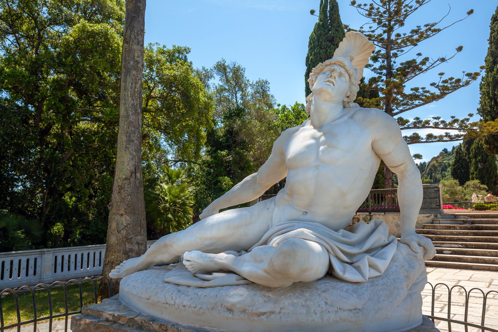 Marble statue of the dying Achilles by Ernst Herter in the gardens of the Achilleion Palace in Corfu.