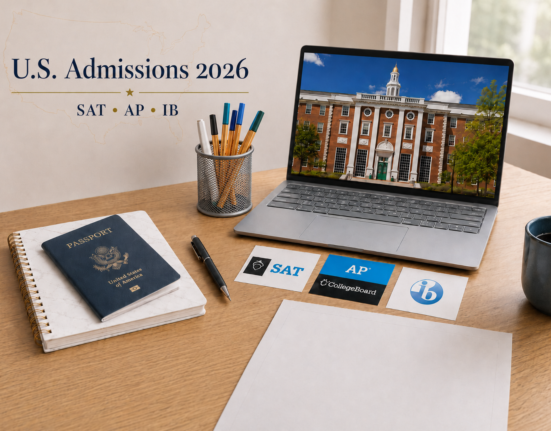 U.S. admissions 2026 study desk with laptop, passport, SAT, AP and IB cards for students in Greece.