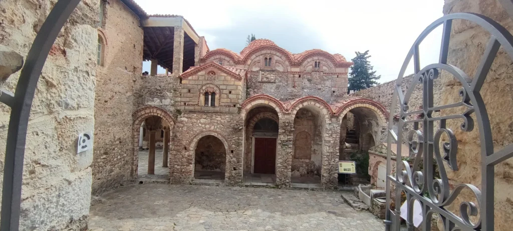 Courtyard and facade of Saint Demetrios Cathedral in Mystras