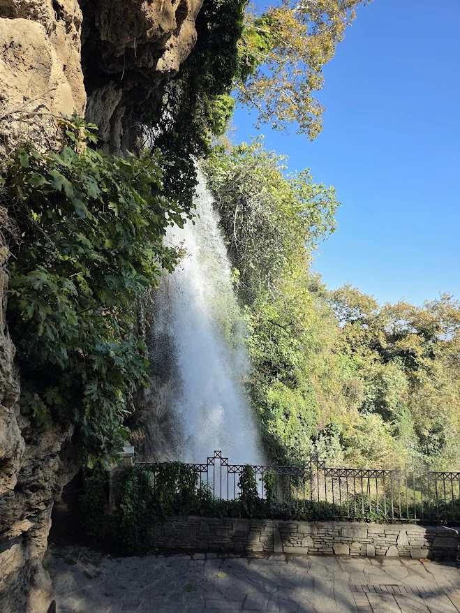 Stone steps descending through Edessa Waterfall Park towards Karanos Waterfall