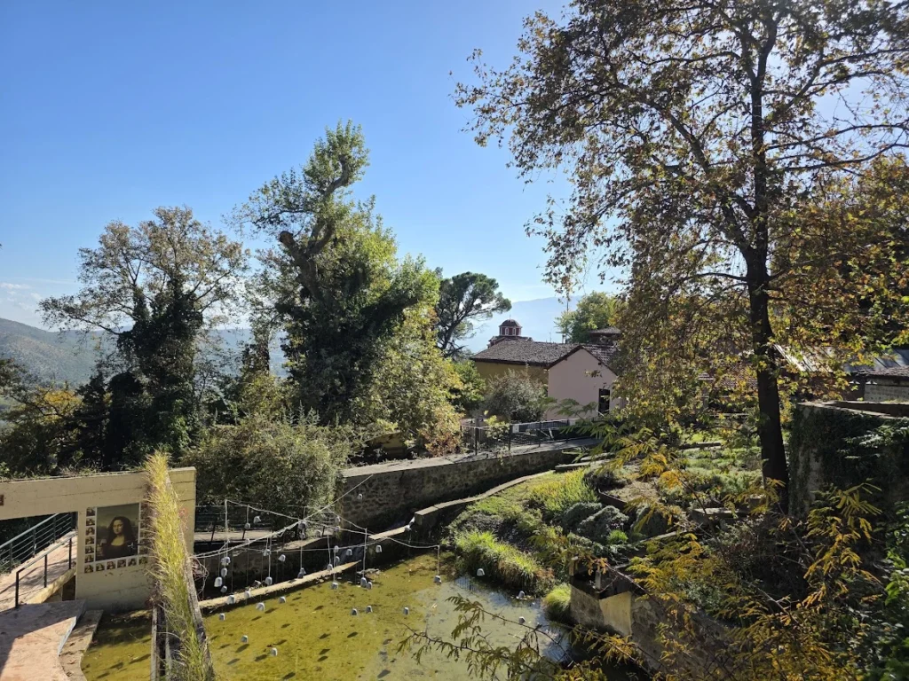Water channels and restored industrial buildings at the Open-Air Water Museum of Edessa