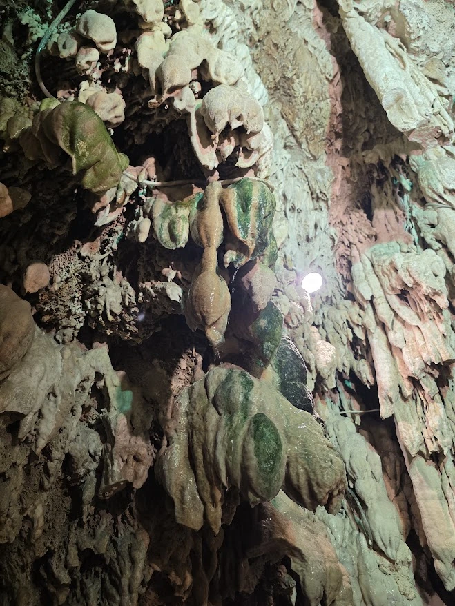 Travertine rock formations inside the waterfall cave in Edessa