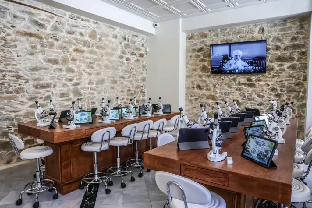 Microscopes and digital displays in the museum’s educational room.