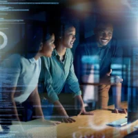 International technology professionals collaborating in a modern workplace