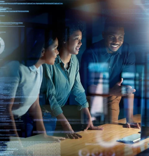 International technology professionals collaborating in a modern workplace