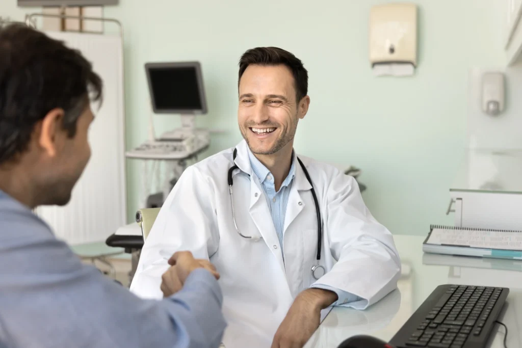 Doctor speaking with a patient during a private healthcare consultation