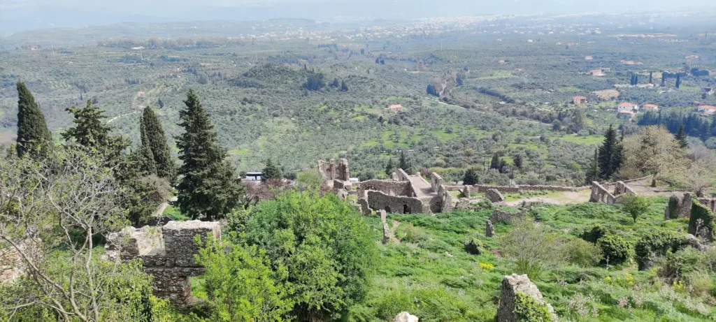 Ruins of Mystras overlooking olive groves on the Laconian plain and modern Sparta.