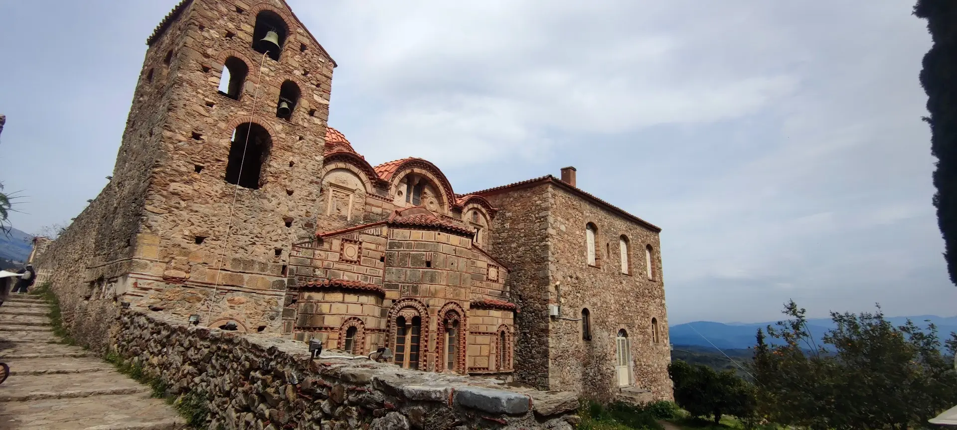 Bell tower and eastern apses of the Metropolis of Saint Demetrios in Mystras.