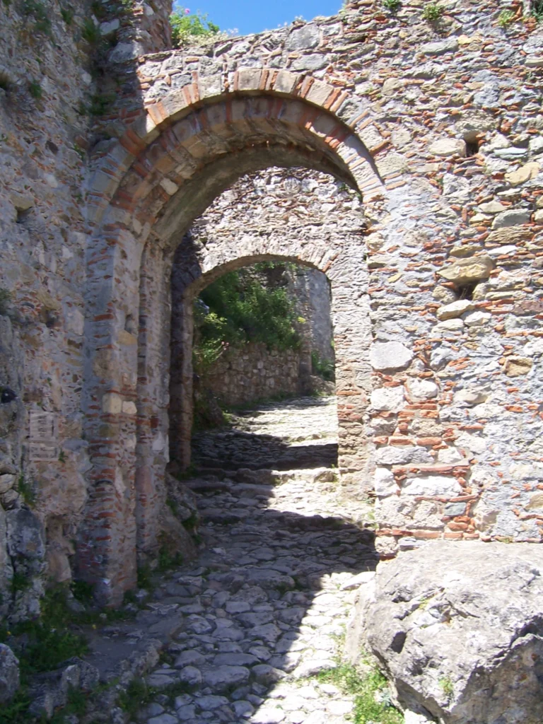 Monemvasia Gate and steep stone-paved passage at Mystras.