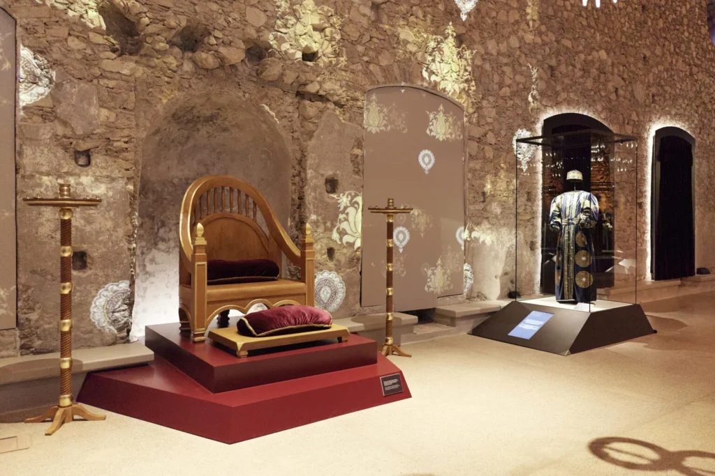 Reconstructed throne and costume display inside the Palace of the Despots