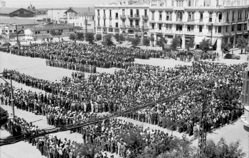 Jewish men gathered for registration in Eleftherias Square during the Nazi roundup in Thessaloniki in July 1942.