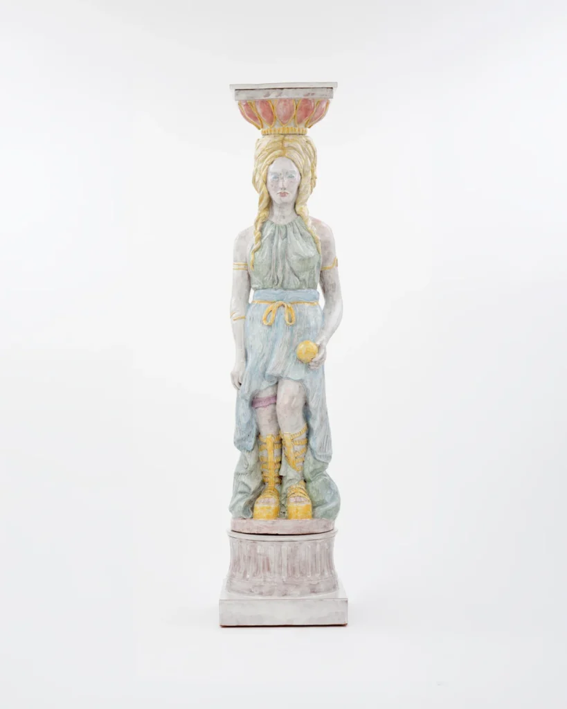 Rachel Feinstein’s Helen, a pastel-coloured majolica caryatid holding an apple.