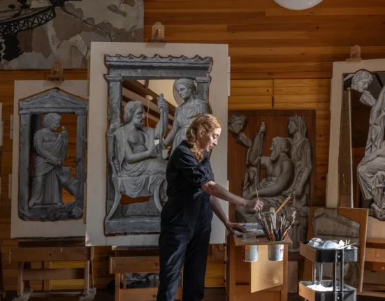 Rachel Feinstein working on her Stele Mirror Paintings in her studio in Mount Desert, Maine.