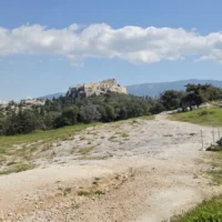 he ancient Pnyx assembly ground in Athens, with the Acropolis and Parthenon in the background.