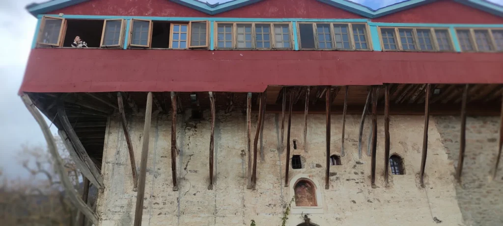 Red wooden gallery of the Monastery of Agios Georgios in Feneos