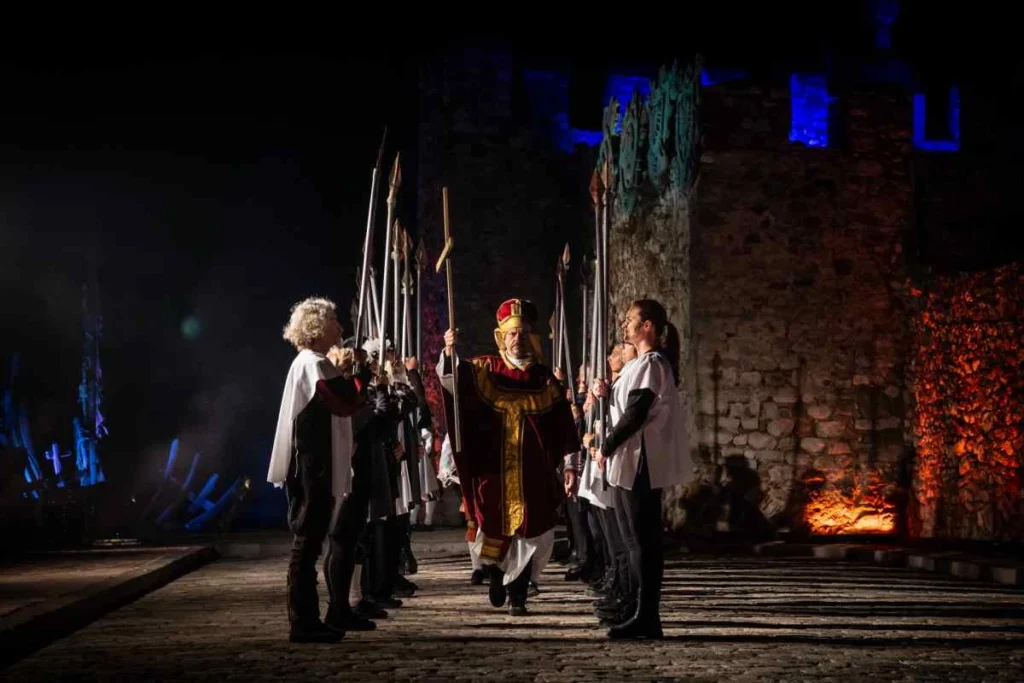 Costumed performers beside the harbour walls during the 2025 Battle of Lepanto commemoration in Nafpaktos