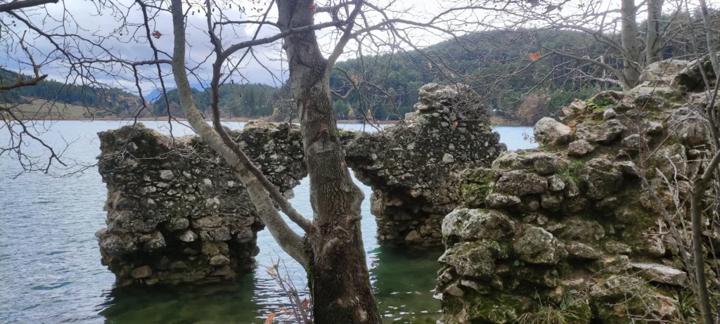 Stone arch from the old Paliomonastiro beside Lake Doxa