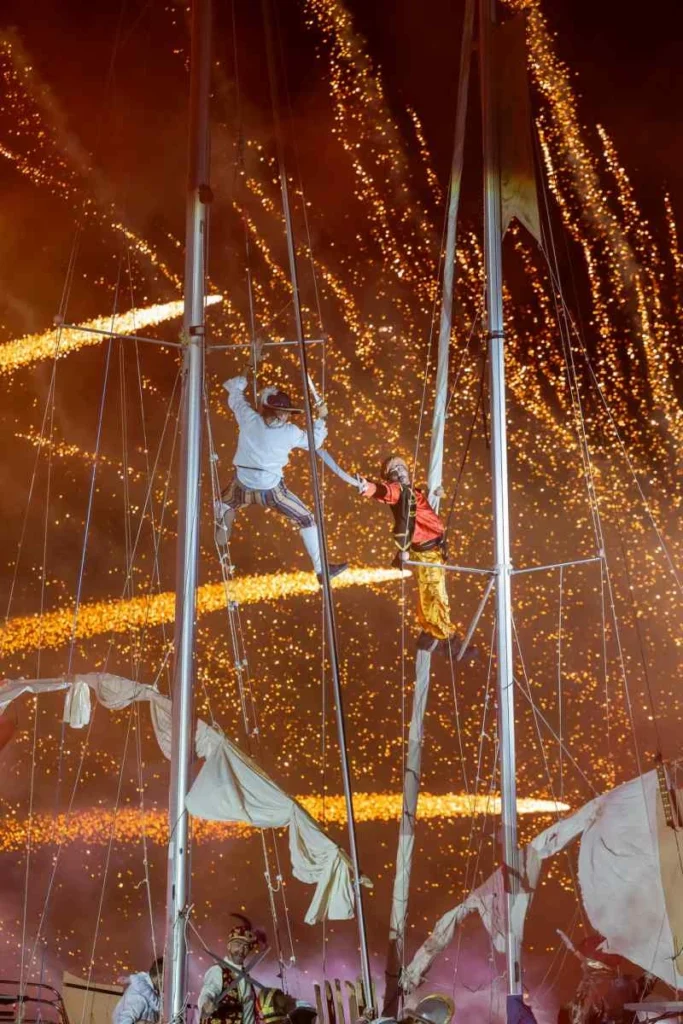 Performers in the rigging of a galley under pyrotechnics during the 2025 Battle of Lepanto re-enactment in Nafpaktos